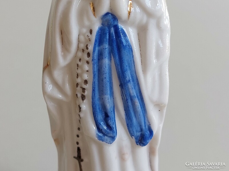 Old religious figure porcelain statue of Mary