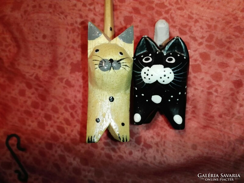 Wooden carved and painted cats.