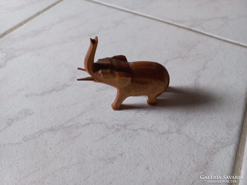 Hand-carved tiny wooden elephant