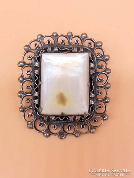 Silver filigree brooch with mother-of-pearl inlay