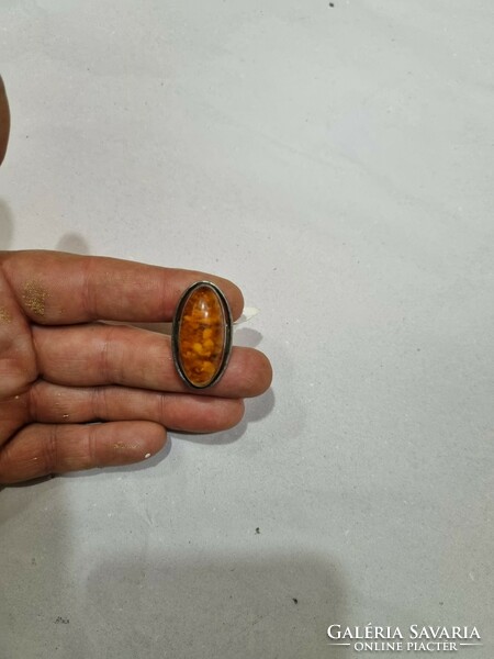 Old silver ring with amber