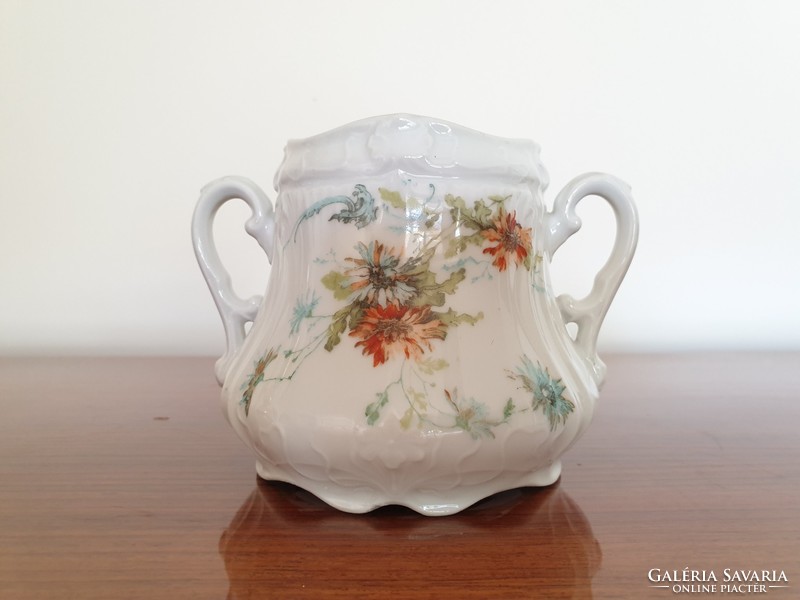 Old porcelain sugar bowl in art nouveau floral sugar vendor