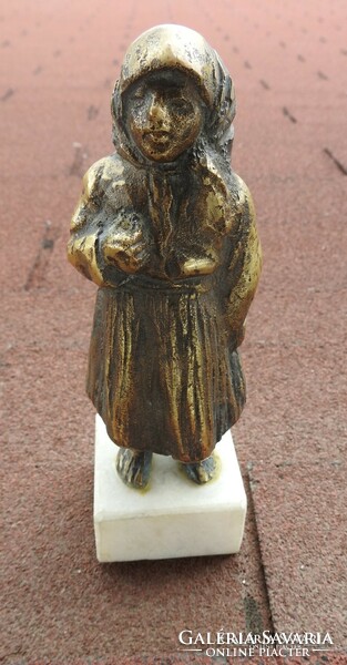 Bronze peasant girl statue on marble soles