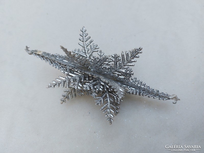 Retro Christmas tree decoration with plastic old silver stars