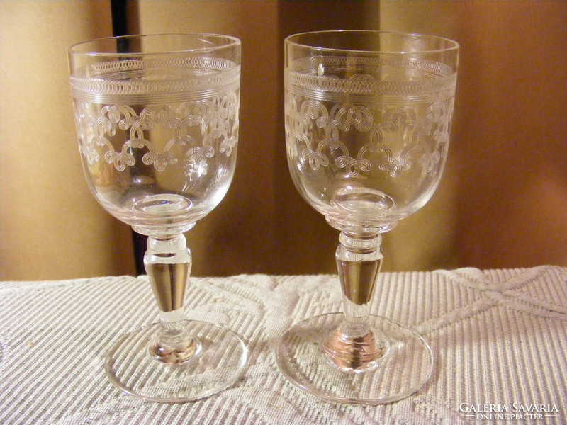 2 old engraved glasses