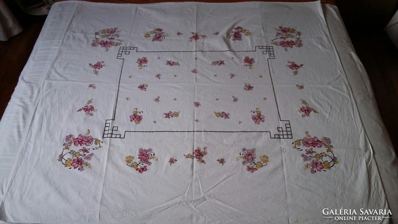 Floral linen tablecloth on a white background