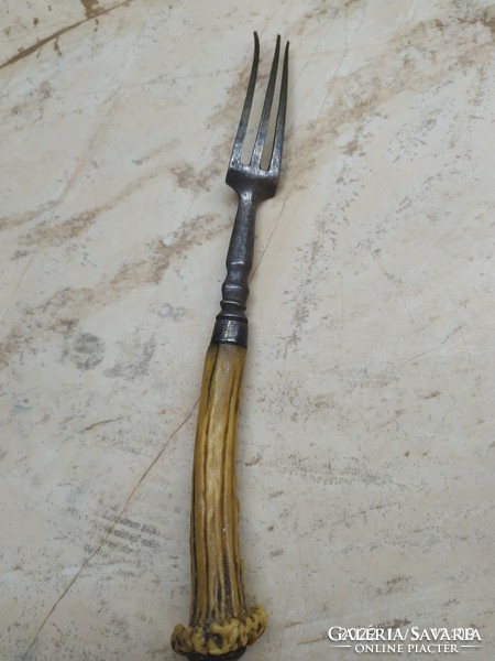 Antique fork with metal, deer antler handle for sale!