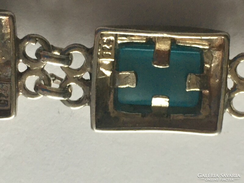Silver bracelet with opal blue glass stone