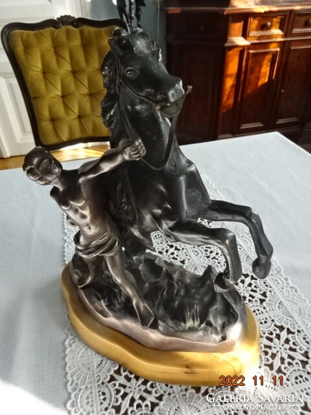 Antique bronze statue of a rider braking his horse, representation of man and animal, weight 7.5 kg. He has!