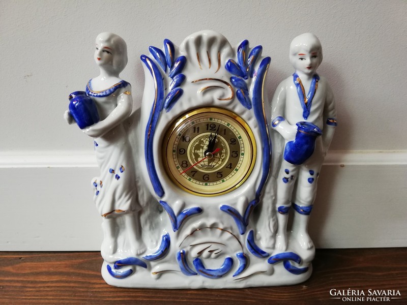 Decorative porcelain fireplace clock with double figures