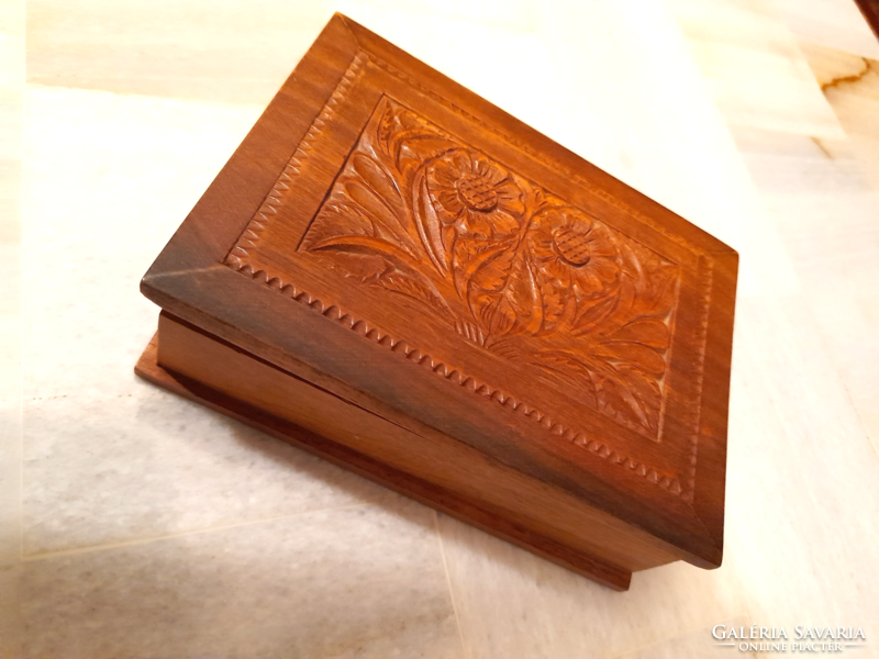 Carved wooden box, cigarette, cigar box decorated with a retro folk motif
