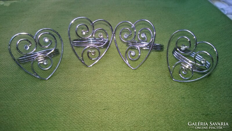 Silver-plated heart-shaped napkin ring also available