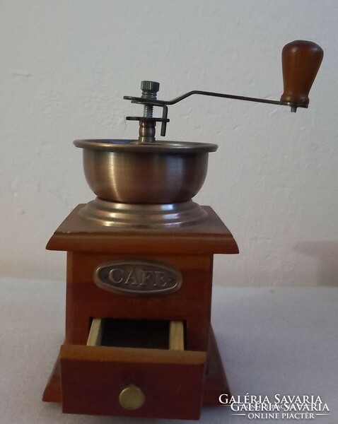 Old copper cupped coffee grinder.