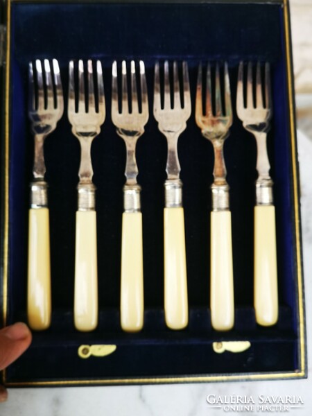 Antique master-marked cutlery set in a box. Dinner or fish silver type set chiseled