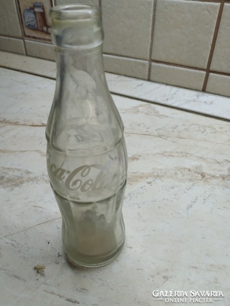 A bottle with a retro feel. Protected coca cola bottle 0.2 L for sale!