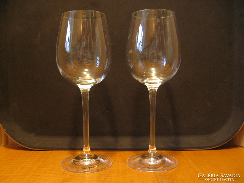 A pair of marked Rona crystal wine and champagne glasses for festive, casual and wedding toasts.