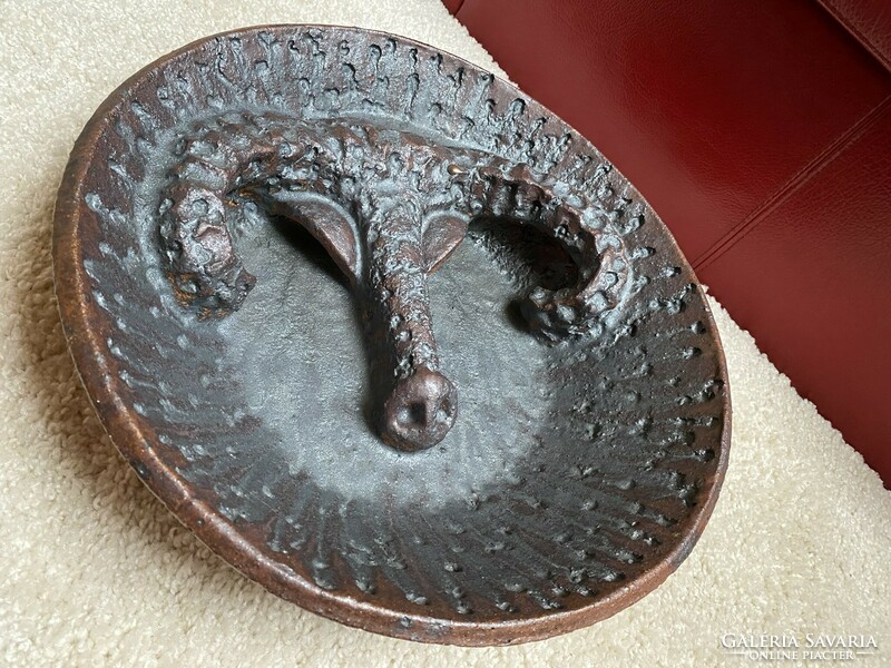 A huge ceramic bowl with a ram's head from '71