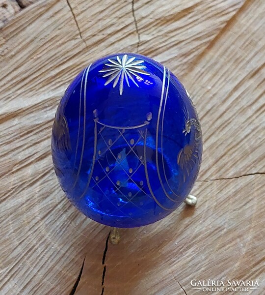 Polished crystal Faberge egg with a gilded eagle motif