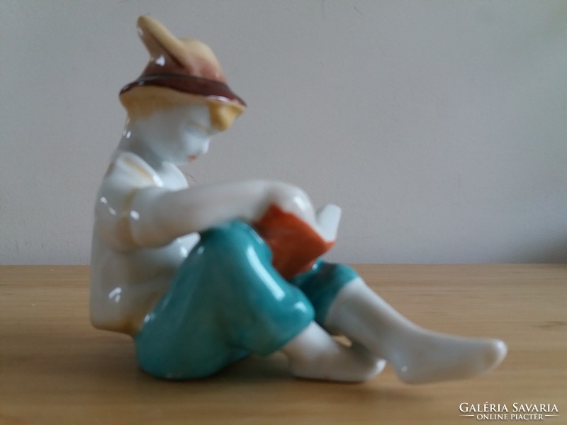 Ravenclaw porcelain figure, a boy in a reading hat
