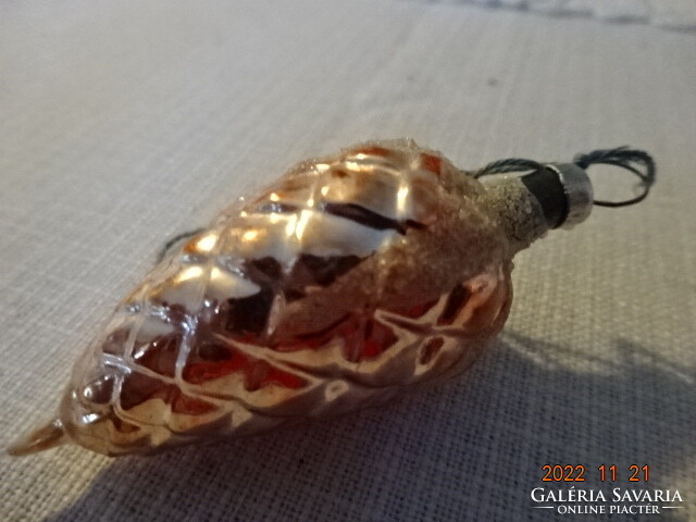 Christmas glass ornament, cone shape, base color is gold, decoration is snowy. He has!