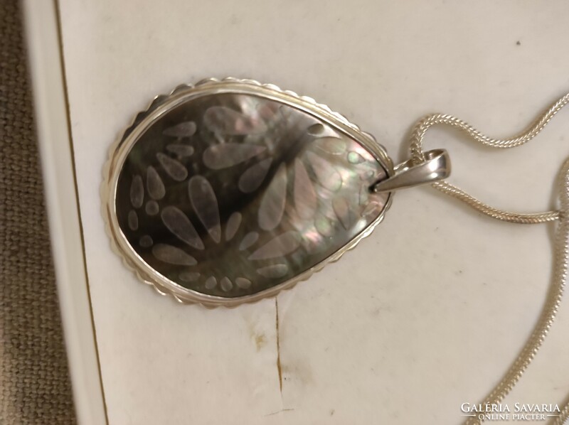Israeli silver necklaces with carved shells