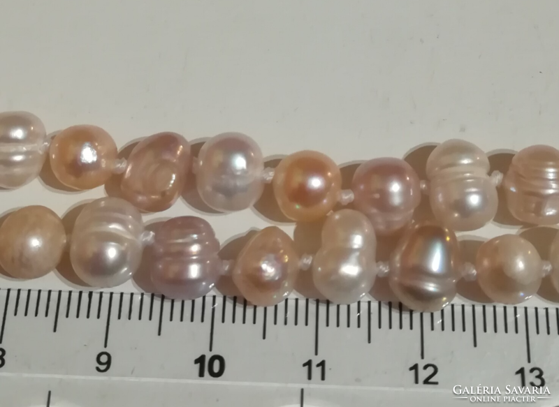 120 cm long cultured pearl necklace.