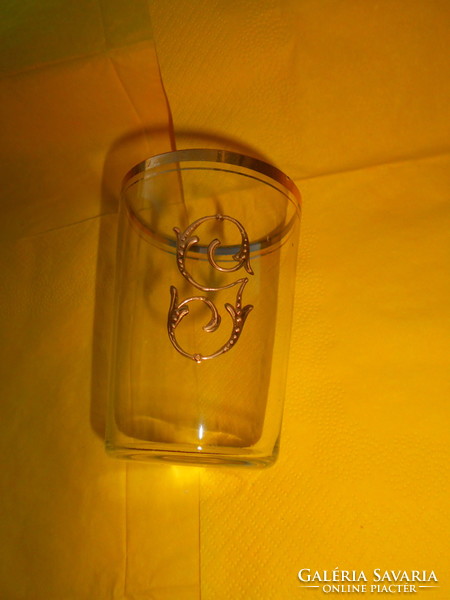 Antique glass cup with monogram on the side