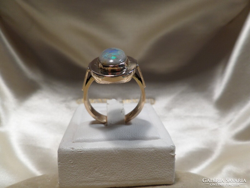 Gold ring with huge opal