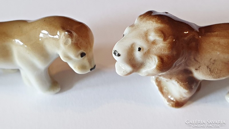 2 pcs. Mini, old porcelain. Couple of lions. 5Cm and 5.5cm. They are long.