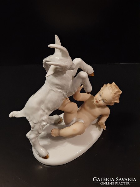 Flawless wallendorf porcelain (statue, figure). Puttó, with a stone goat.