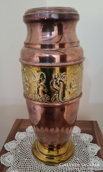 Embossed vase decorated with copper and brass