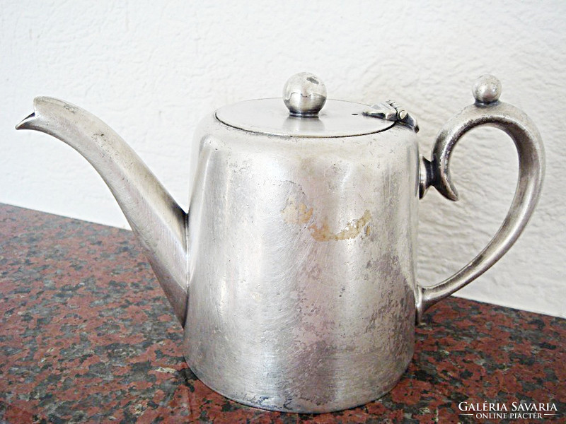 Antique old coffee pot with vintage metal spout
