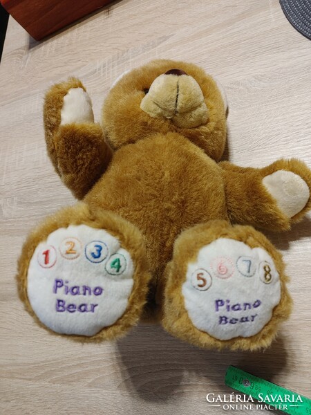 Piano bear musical teddy bear 2 AA batteries are required