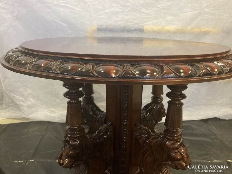 Richly carved eclectic style table