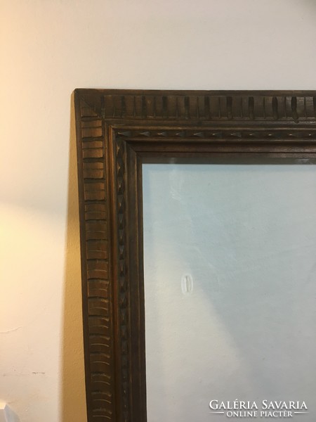 Antique carved picture frame, with original glass plate