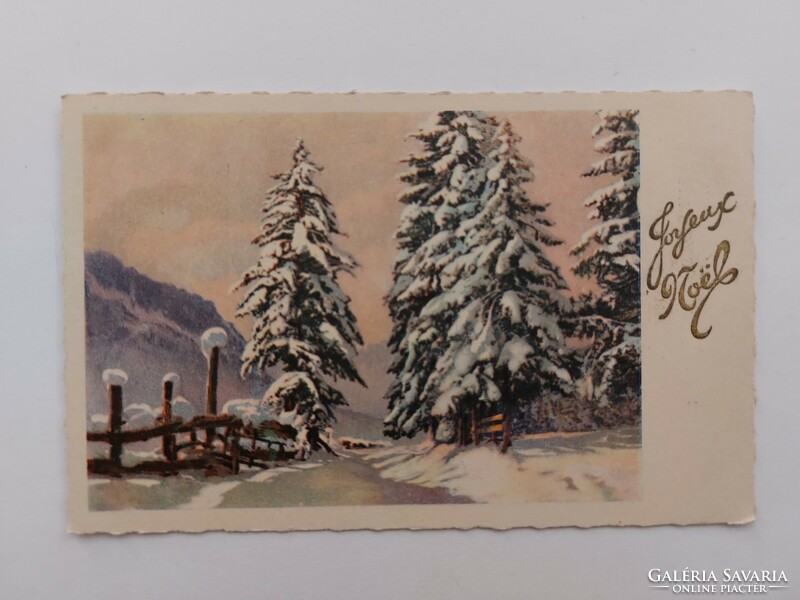 Old Christmas postcard postcard with snowy pine trees