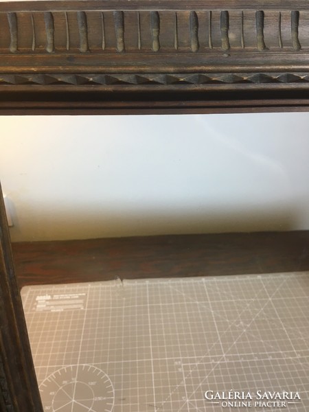 Antique carved picture frame, with original glass plate