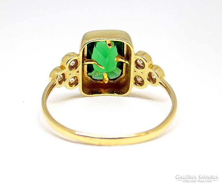Gold ring with green stones (zal-au114045)