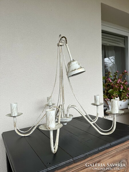 Chandelier made of metal, on an off-white base, antiqued with antique gold