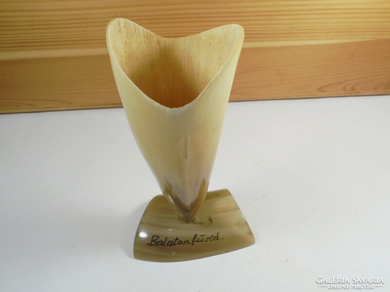 Retro old carved horned horn statue on the base of a table decoration - cattle - Balatonfüred tourist souvenir