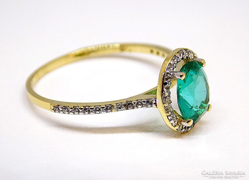Gold ring with green stones (zal-au109632)