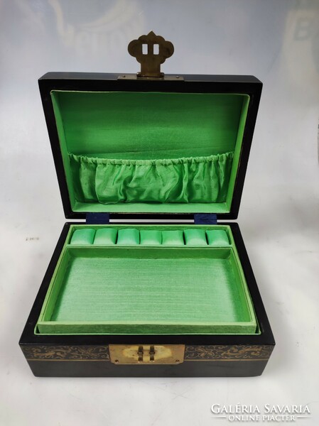 Old Chinese jewelry box with mother-of-pearl decoration and apple green inner lining