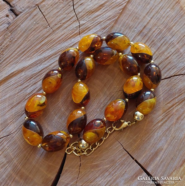 Beautiful imitation amber necklace with gold-plated spacers