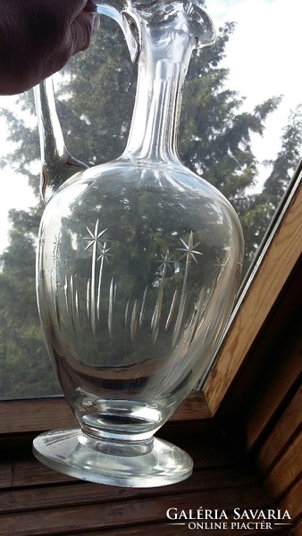 Old glass polished decanter, pitcher, spout