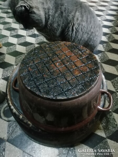 Antique iron pot is in the condition shown in the pictures
