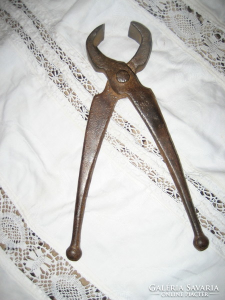 Antique wrought iron tongs