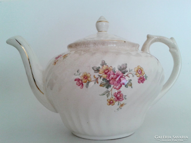 Old granite flower teapot spout