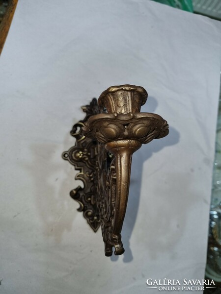 Old copper wall candlestick