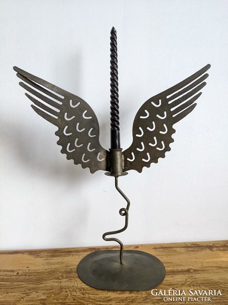 Candle holder with angel wings