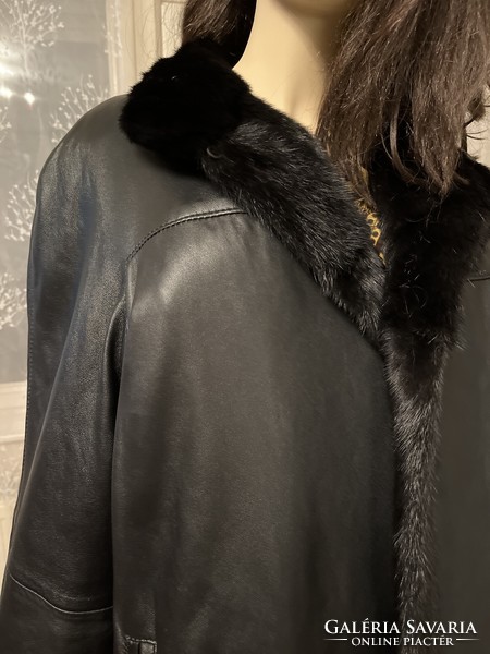 Two-sided reversible jacket from Vienna; one side is real fur, the other is pure leather..